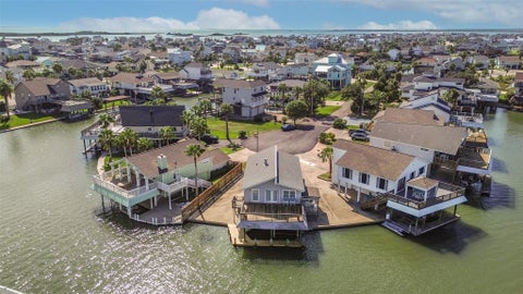 Photo of 1302 Coral Way, Tiki Island, TX 77554 (MLS # 65643104)