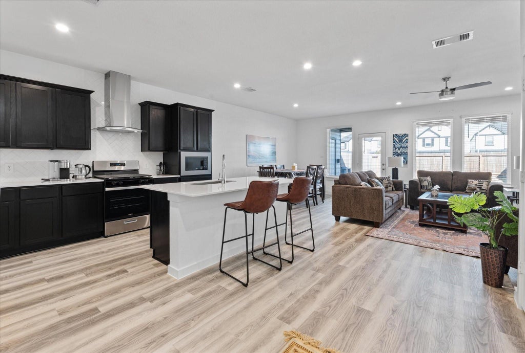 Photo of 3215 Rainwood Gate Drive, Houston, TX 77047 (MLS # 15792991)