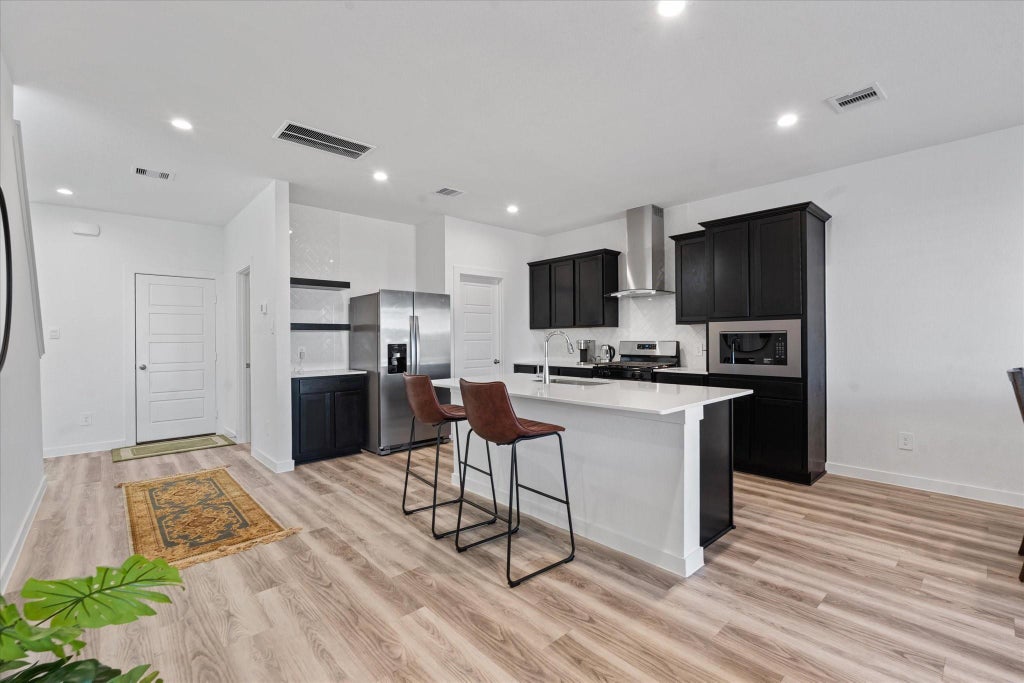 Photo of 3215 Rainwood Gate Drive, Houston, TX 77047 (MLS # 15792991)