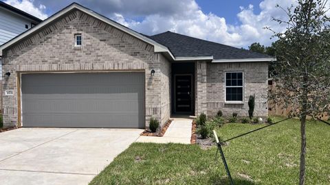 Photo of 10638 Altitude Way, Conroe, TX 77303 (MLS # 36789786)