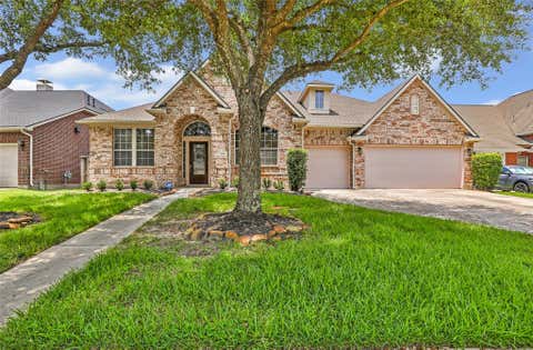 Photo of 7415 Bearden Falls Lane, Humble, TX 77396 (MLS # 38751701)