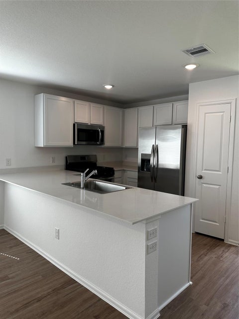 Photo of 4239 Barrington Cove Lane Ln, Baytown, TX 77521 (MLS # 38700123)
