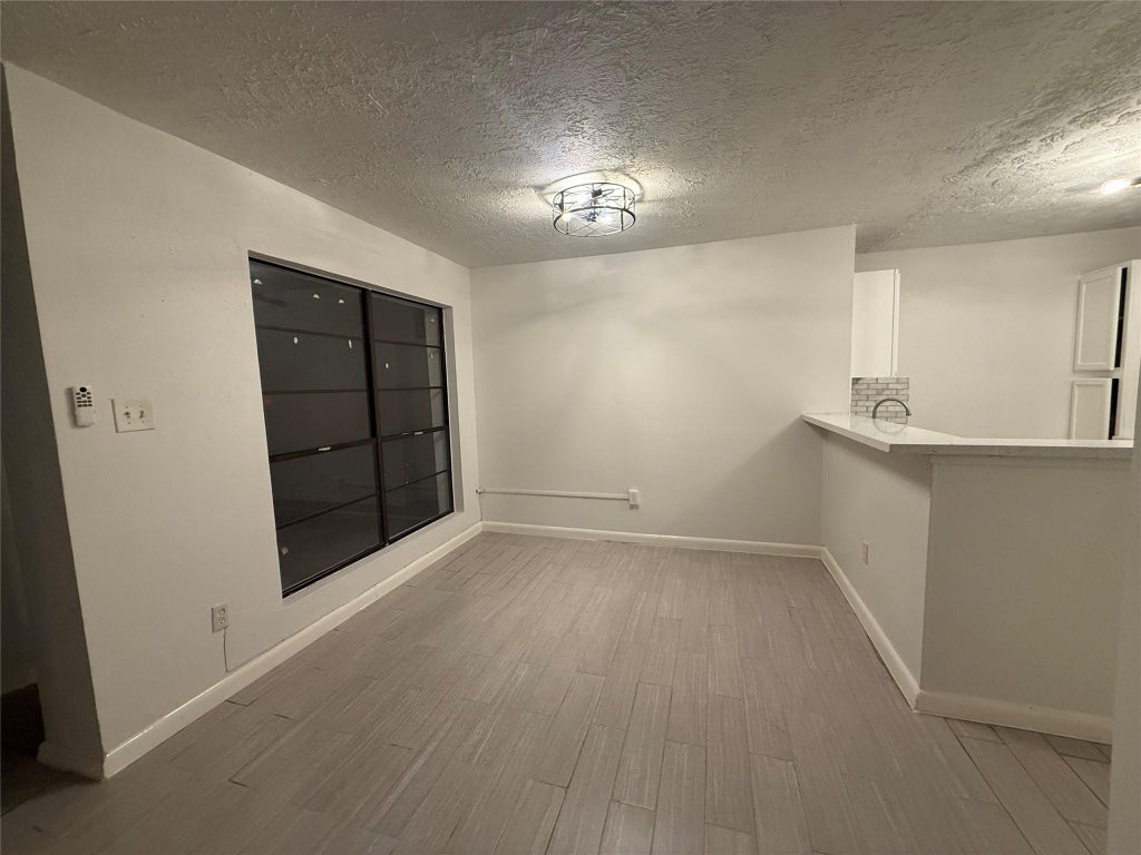 Photo of 8553 Wilcrest Drive, Houston, TX 77099 (MLS # 42467892)