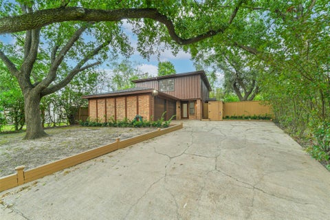 Photo of 3111 Rockyridge Drive, Houston, TX 77063 (MLS # 12587021)