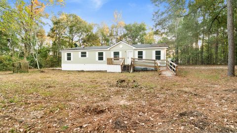 Photo of 13507 Enchanted Cove, Willis, TX 77318 (MLS # 69608233)