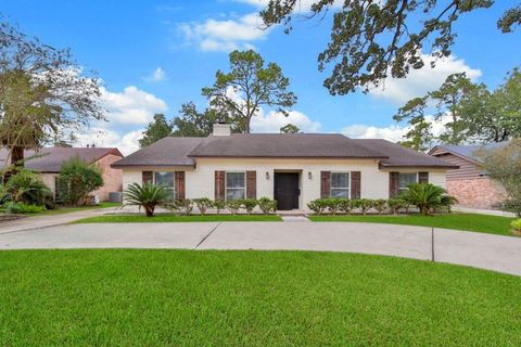 Photo of 10042 Briar Forest Drive, Houston, TX 77042 (MLS # 22592384)