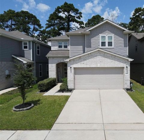 Photo of 734 Hardwood Grove Court, Houston, TX 77090 (MLS # 50684354)