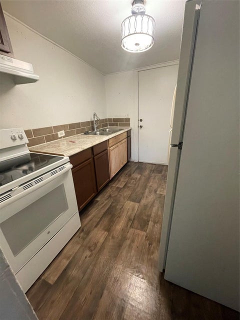 Photo of 115 12th Street, Port Arthur, TX 77640 (MLS # 83749348)
