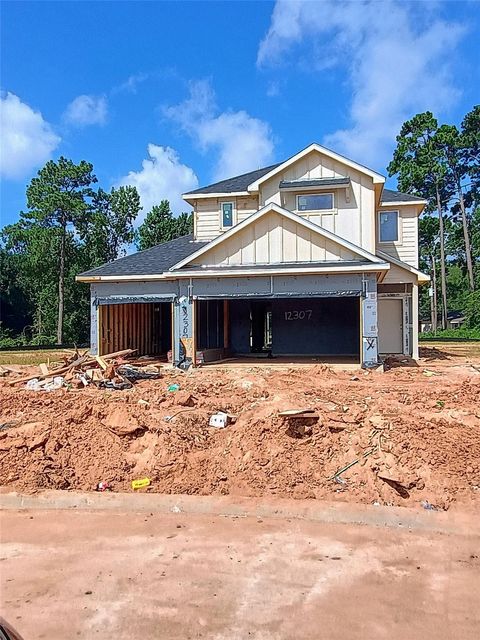 Photo of 9750 Enclave Ridge Road, Willis, TX 77318 (MLS # 24964820)