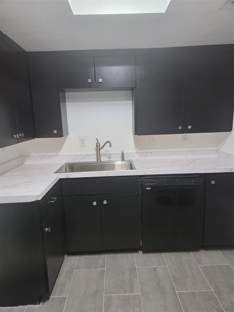 Photo of 7712 Challie Lane #7712, Houston, TX 77088 (MLS # 62727837)