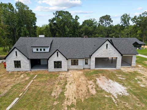 Photo of 117 Daisy Ln LN, Baytown, TX 77523 (MLS # 63057018)