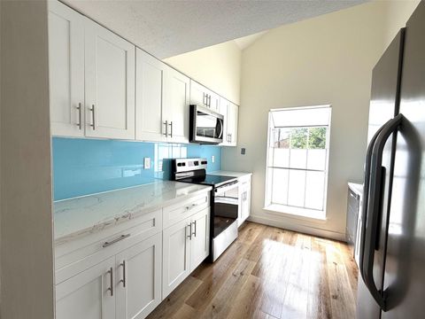 Photo of 9809 Richmond Avenue #5, Houston, TX 77042 (MLS # 28345355)