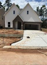 Photo of 11310 Iron Horse Street St, Montgomery, TX 77316 (MLS # 97556032)