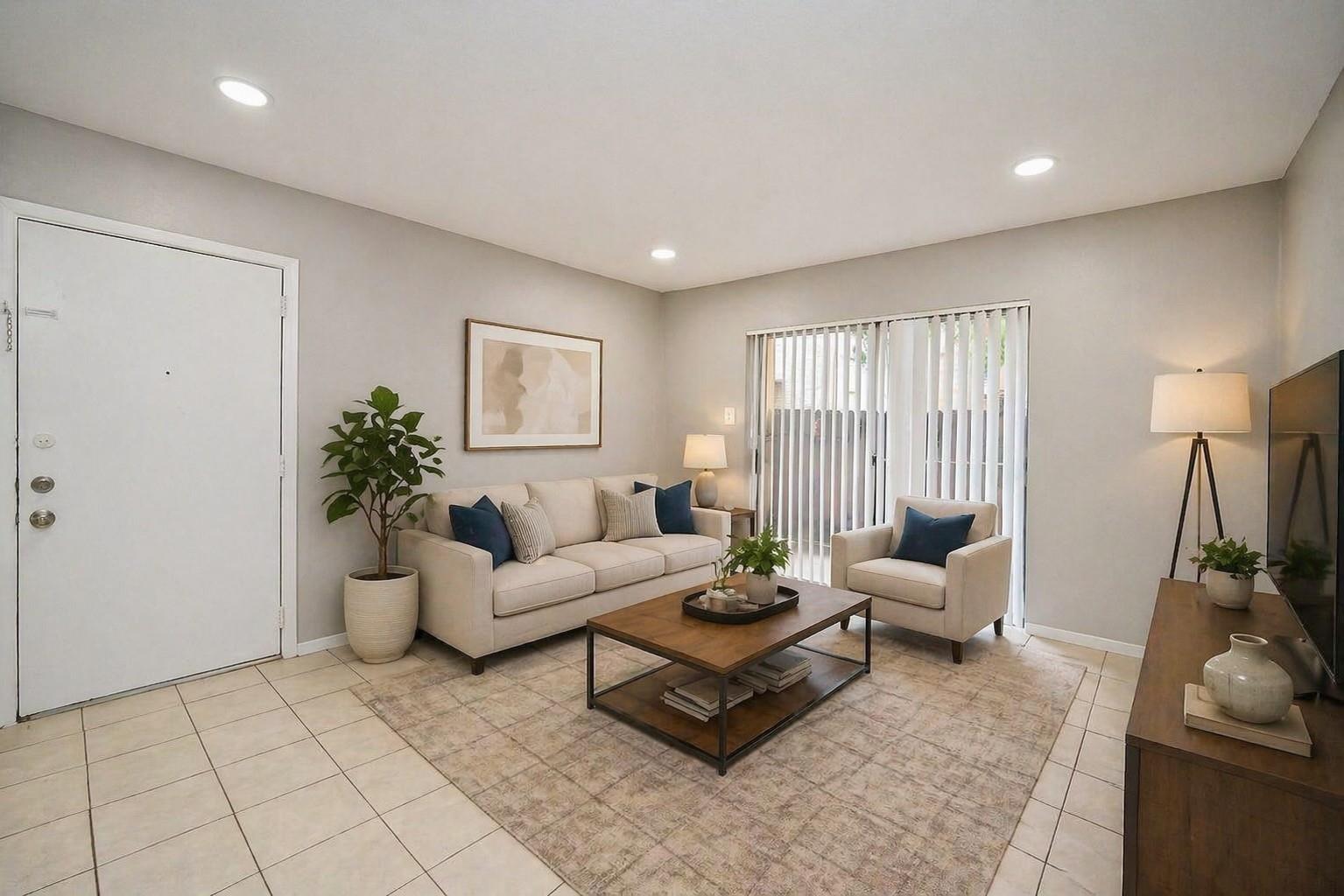 For Rent! Condo conveniently located on the first floor! Virtually Staged living room.