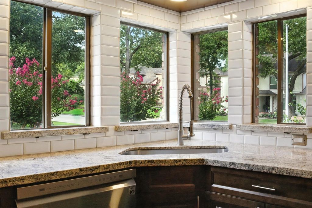 Photo of 2303 Millvale Drive, Houston, TX 77345 (MLS # 50069555)