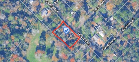 Photo of 1 Forest Glen, Conroe, TX 77303 (MLS # 72274919)