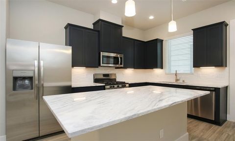 Photo of 9012 Lonestar River Lane, Houston, TX 77080 (MLS # 34524397)