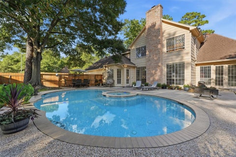 Photo of 5819 Rocky Brook Drive, Houston, TX 77345 (MLS # 75911103)
