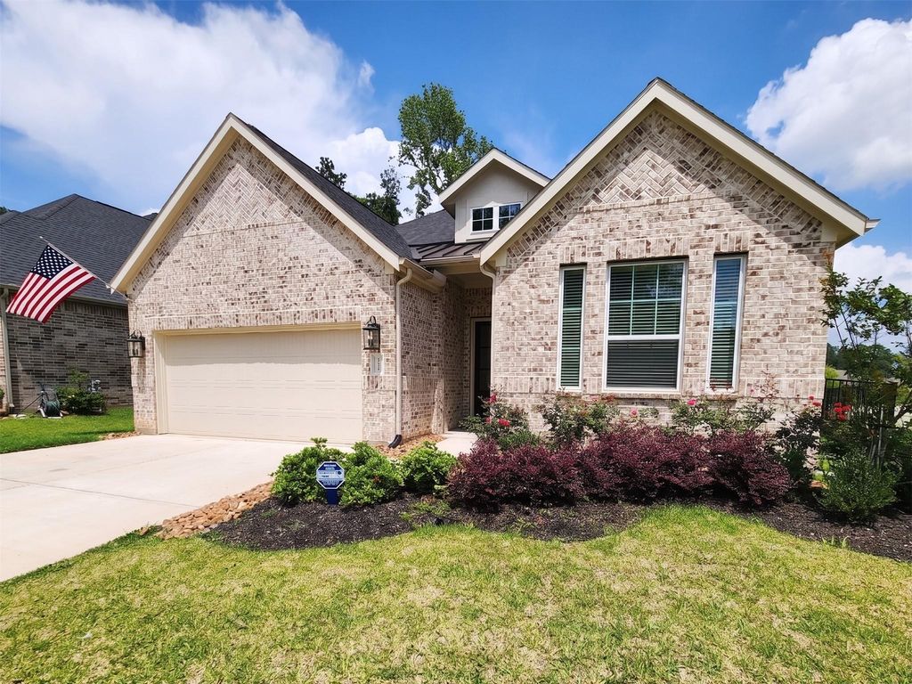 Photo of 204 Bronzewood Terrace Court, Conroe, TX 77318 (MLS # 21827213)