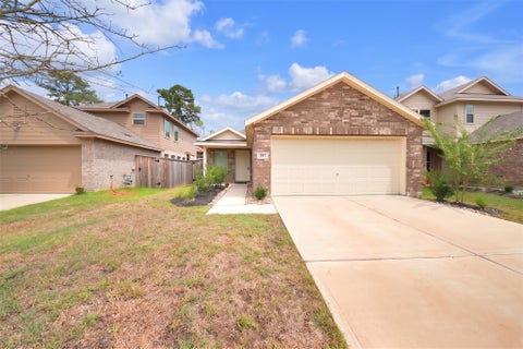 Photo of 597 Falling Cave Drive, Willis, TX 77378 (MLS # 20794675)