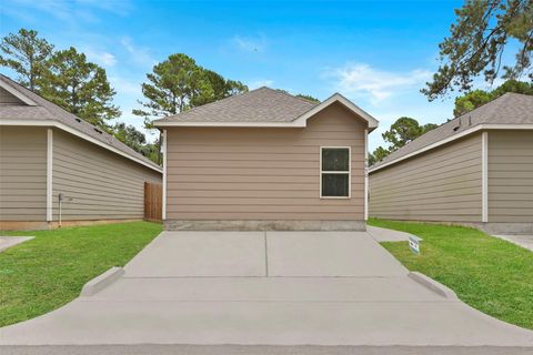 Photo of 9650 Warm Spring Spg, Willis, TX 77318 (MLS # 37919083) Photo of 9650 Warm Spring Spg, Willis, TX 77318 (MLS # 37919083)