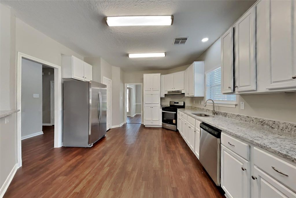 Photo of 8615 Mile Run Road, Humble, TX 77346 (MLS # 4306717)