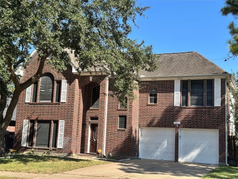 Photo of 10810 Perigrine Drive, Houston, TX 77065 (MLS # 32708048)
