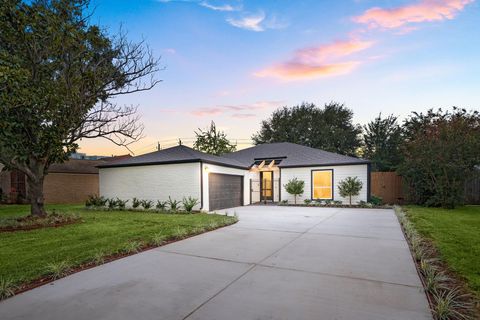 Photo of 11319 Wickersham Lane, Houston, TX 77077 (MLS # 92521049)