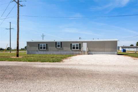 Photo of 1002 Boyce Street, Bovina, TX 79009 (MLS # 78638558) Photo of 1002 Boyce Street, Bovina, TX 79009 (MLS # 78638558)