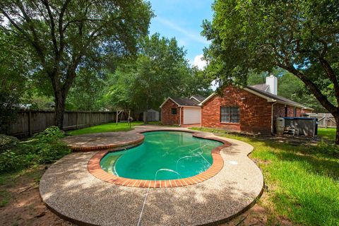 Photo of 34 Green Slope Place, The Woodlands, TX 77381 (MLS # 48044711)