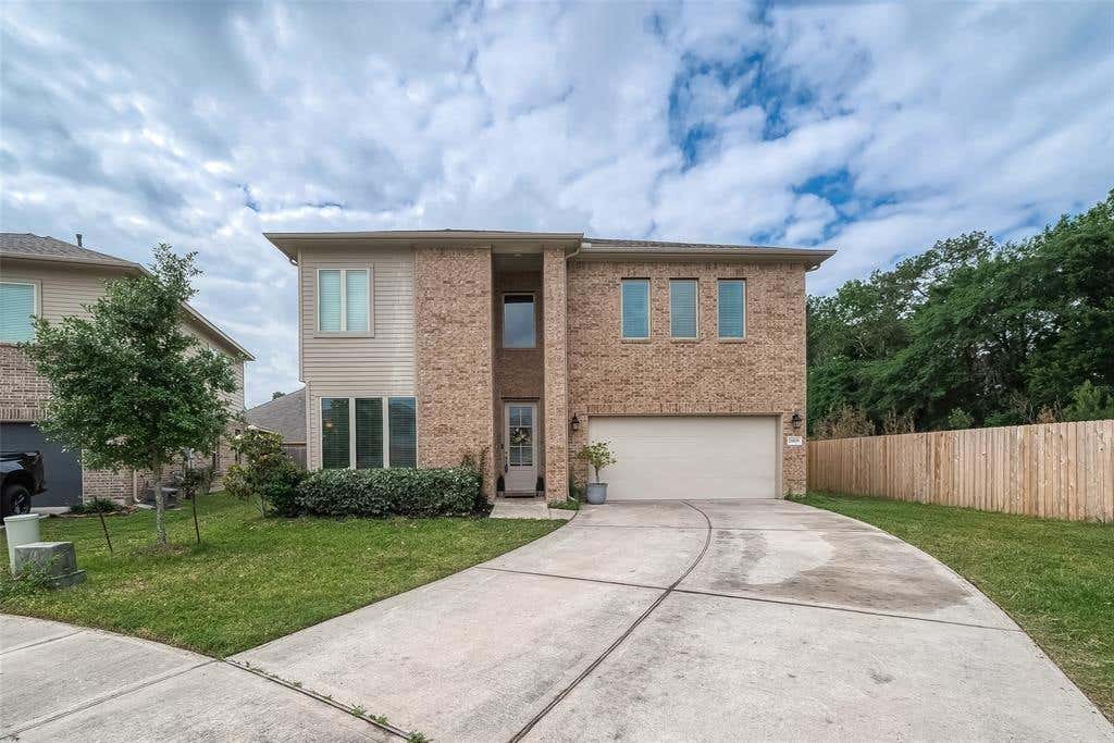 Photo of 21029 Crinet Sq St ST, Kingwood, TX 77339 (MLS # 50189477)