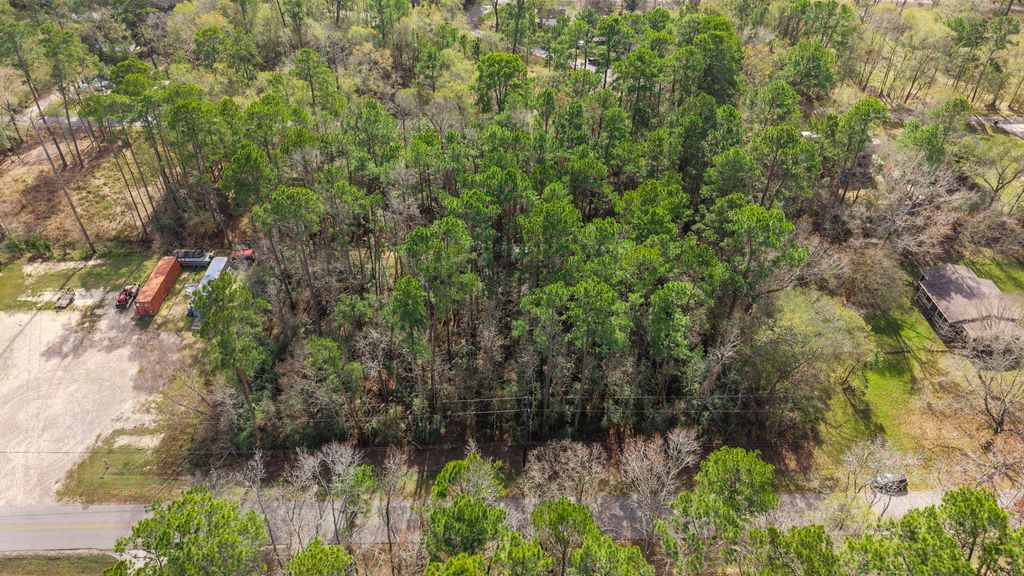 Photo of 0 Magnolia Point Drive, Huffman, TX 77336 (MLS # 62242571)