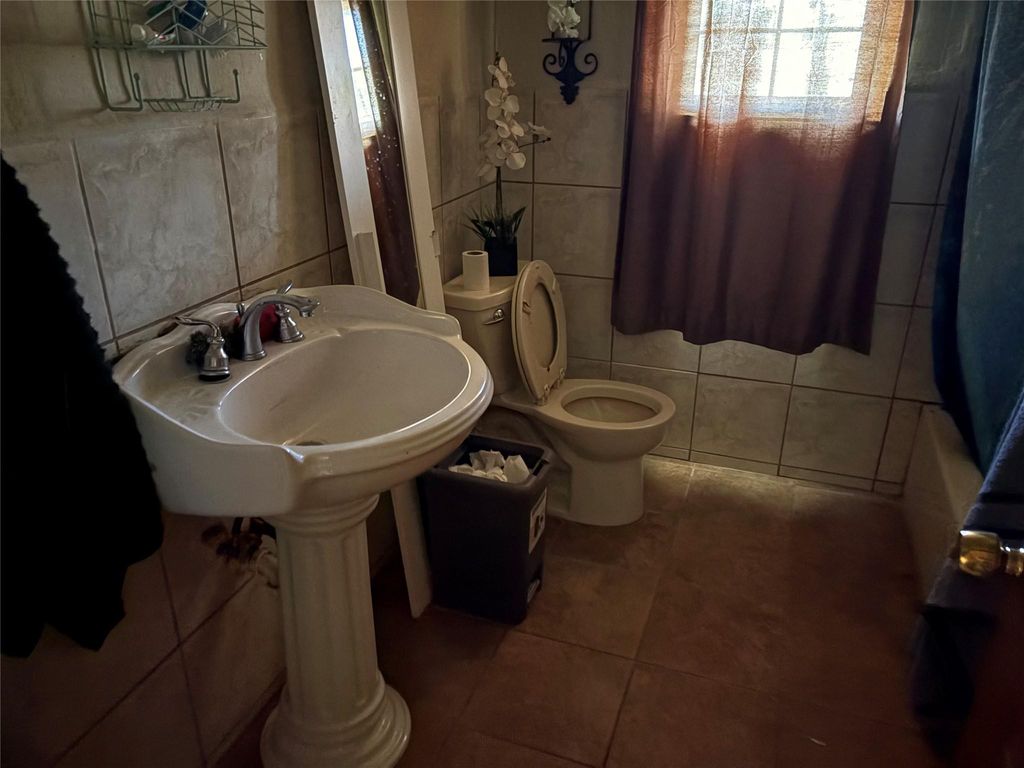 Photo of 342 Ishmeal Street, Houston, TX 77091 (MLS # 31220515)