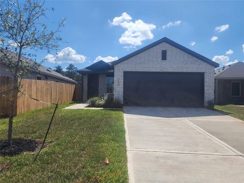 Photo of 1615 Winwood Drive Dr, Conroe, TX 77303 (MLS # 42213177)