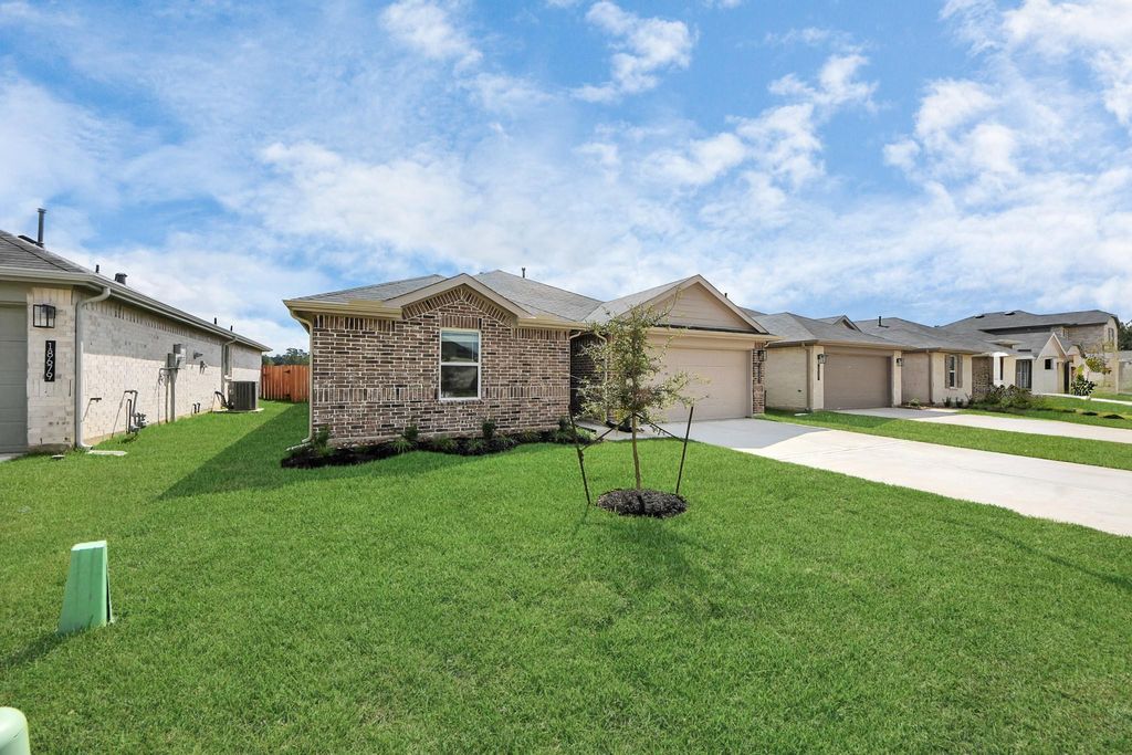 Photo of 18683 Bernoulli Drive, New Caney, TX 77357 (MLS # 92145822)
