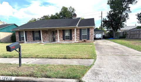 Photo of 12615 Shannon Hills Drive, Houston, TX 77099 (MLS # 68594499)