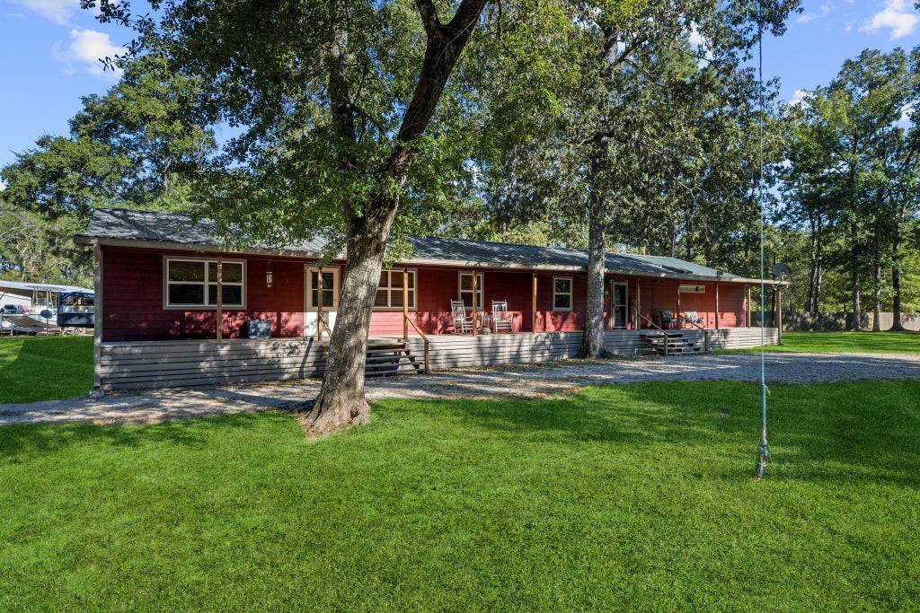Photo of 247 County Road 3433, Cleveland, TX 77327 (MLS # 59341454)