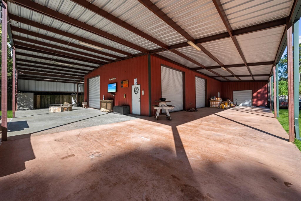 Photo of 247 County Road 3433, Cleveland, TX 77327 (MLS # 59341454)