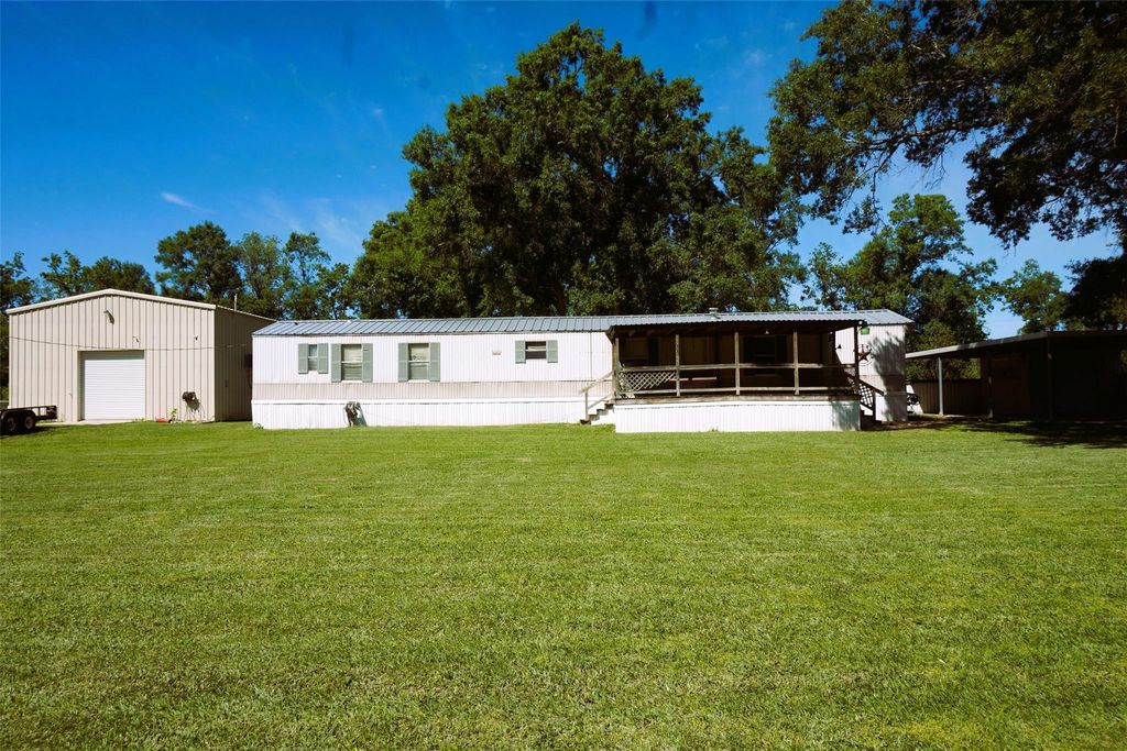 Photo of 20222 Redbud Drive, New Caney, TX 77357 (MLS # 59441408)