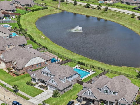 Photo of 9706 Suffolk Downs Drive, Mont Belvieu, TX 77523 (MLS # 32320089)