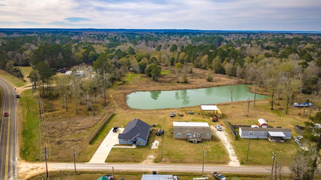 Photo of 276 Hoot Owl Hollow Road, Goodrich, TX 77335 (MLS # 54352706)