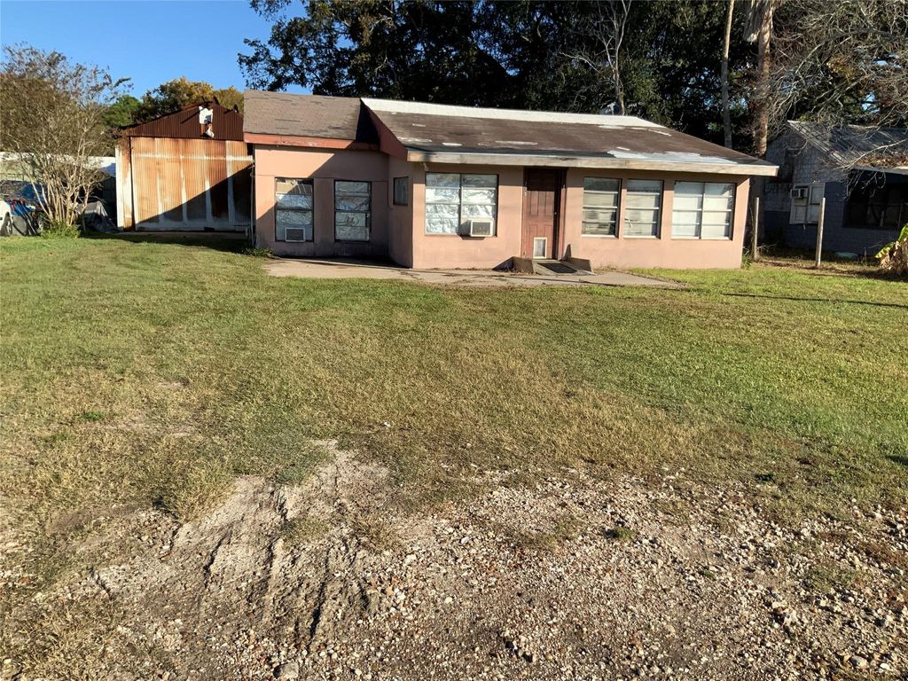 Photo of 215 Mcneir Street, Anahuac, TX 77514 (MLS # 43849271)