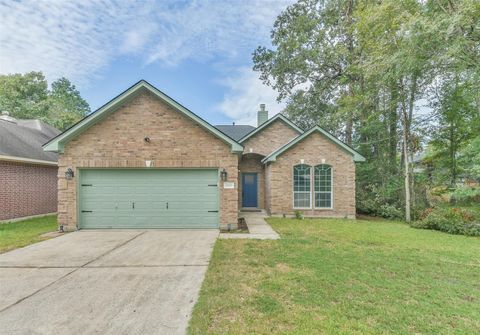 Photo of 10909 Redbird, Conroe, TX 77385 (MLS # 34497335)