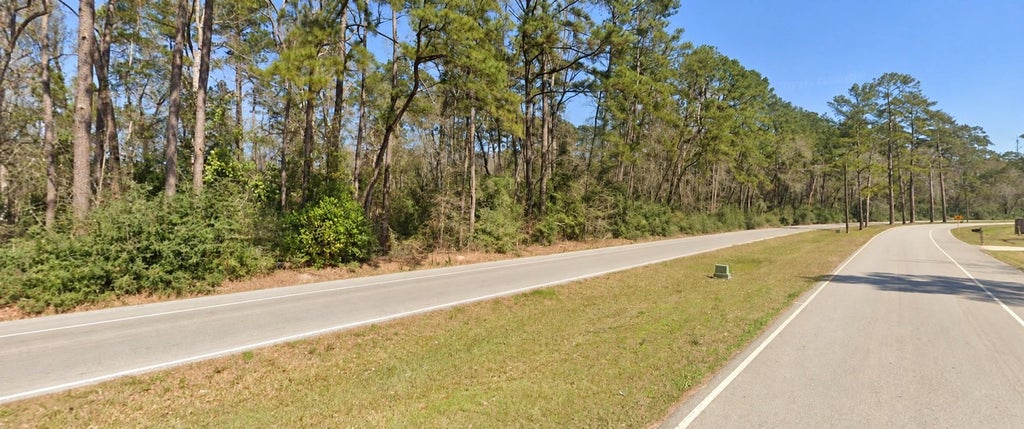 Photo of 0 Roman Forest Blvd, Roman Forest, TX 77357 (MLS # 73833984)