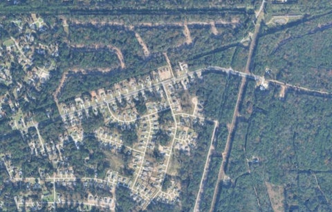 Photo of 0 Roman Forest Blvd, Roman Forest, TX 77357 (MLS # 73833984)