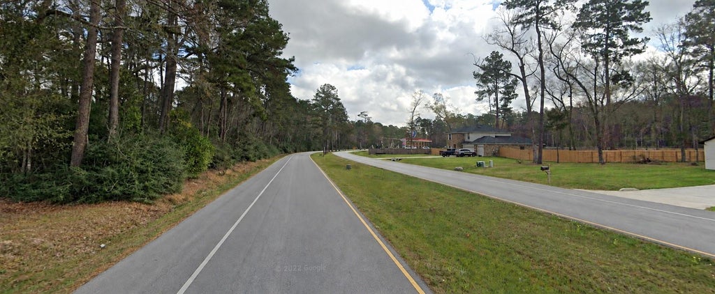 Photo of 0 Roman Forest Blvd, Roman Forest, TX 77357 (MLS # 73833984)