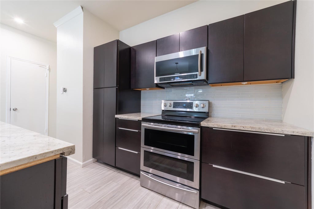Photo of 7332 Regency Square Court #7332, Houston, TX 77036 (MLS # 2730370)
