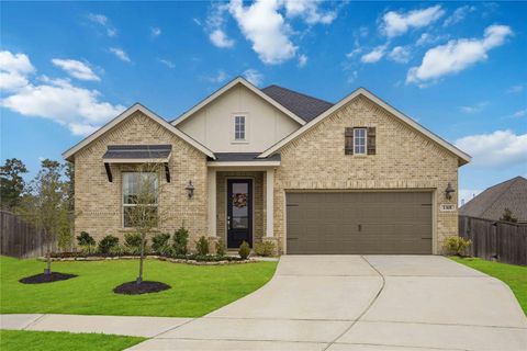 Photo of 1301 Knollbridge Point Lane, Pinehurst, TX 77362 (MLS # 77585835)