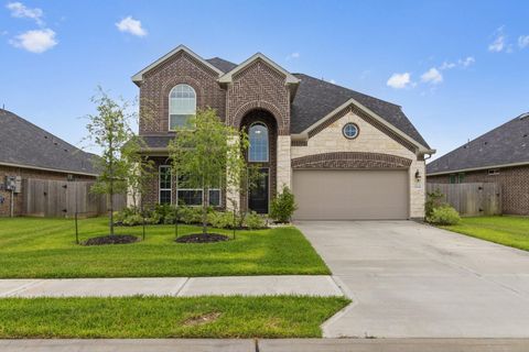 Photo of 12114 Champions Forest Drive, Mont Belvieu, TX 77535 (MLS # 24845021)