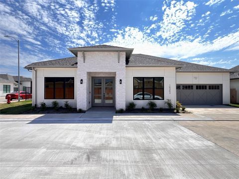 Photo of 10303 Anchorage Passage Way, Richmond, TX 77407 (MLS # 42369866)